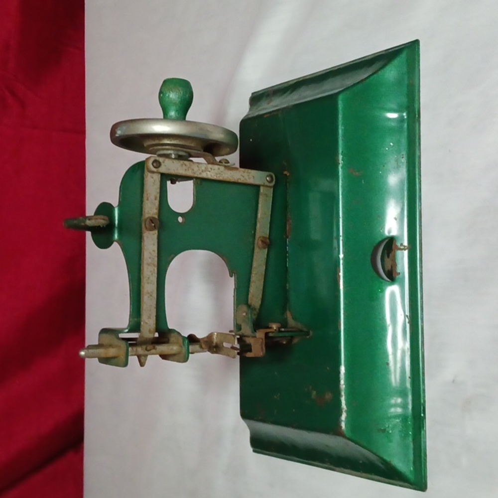 Antique toy sewing machine working condition